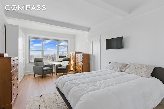 1 Plaza St W Unit 12C, New York City, NY 11217 - bedroom with beamed ceiling and wood finished floors
