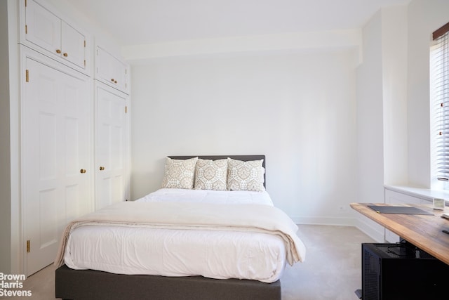 117 E 72nd St Unit 2W, New York City, NY 10021 - bedroom featuring light carpet and baseboards