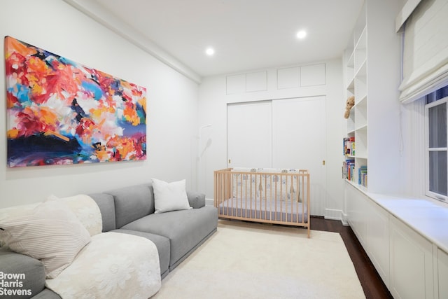 117 E 72nd St Unit 2W, New York City, NY 10021 - bedroom featuring dark wood-type flooring and recessed lighting