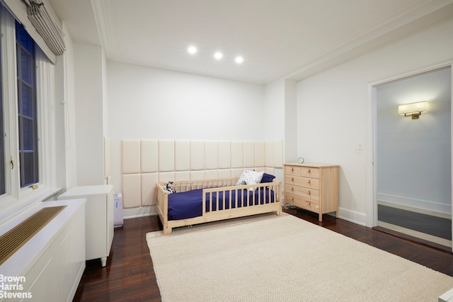 117 E 72nd St Unit 2W, New York City, NY 10021 - bedroom featuring dark wood-type flooring, recessed lighting, and baseboards
