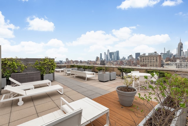 20 E 9th St Unit 2X, New York City, NY 10003 - deck featuring a view of skyline and an outdoor hangout area