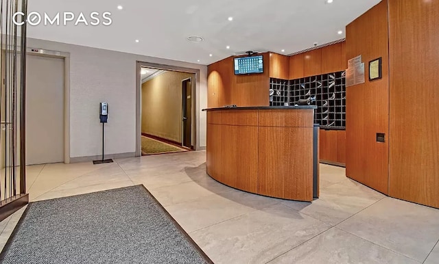 reception area featuring a dry bar