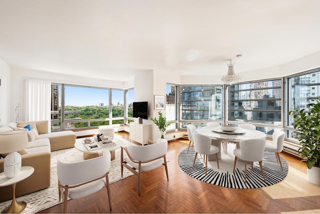 301 W 57th St Unit 14C, New York City, NY 10019 - dining room featuring a chandelier