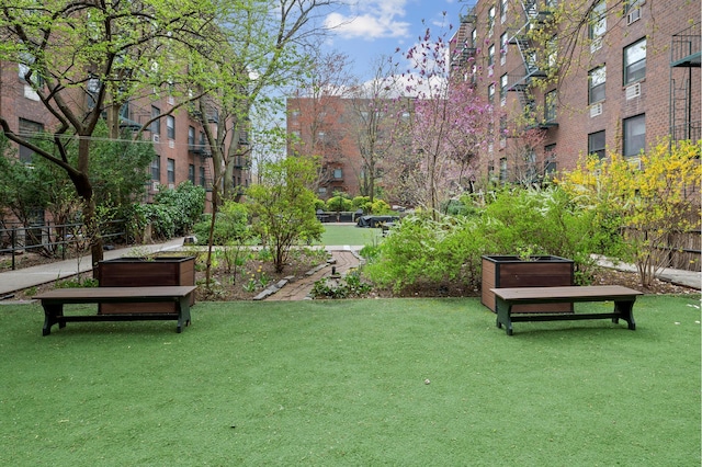 surrounding community featuring a lawn