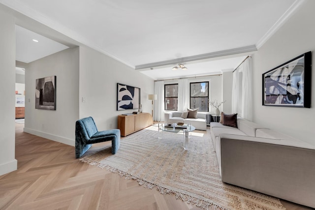 living area with crown molding and baseboards