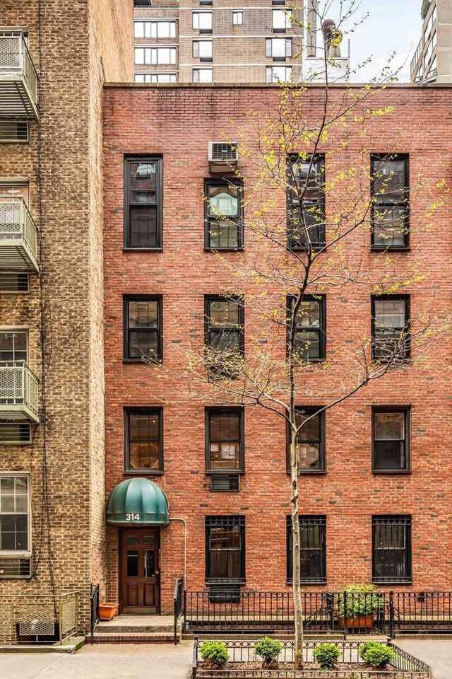 314 E 50th St Unit 1E, New York City, NY 10022 - view of apartment building / complex