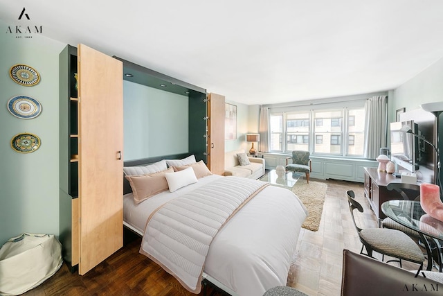155 E 38th St Unit 9-H, New York City, NY 10016 - bedroom with wood finished floors