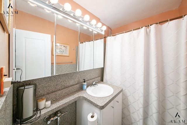 155 E 38th St Unit 9-H, New York City, NY 10016 - bathroom with vanity and a shower with shower curtain