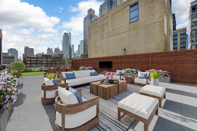 view of patio / terrace featuring an outdoor living space and a skyline view
