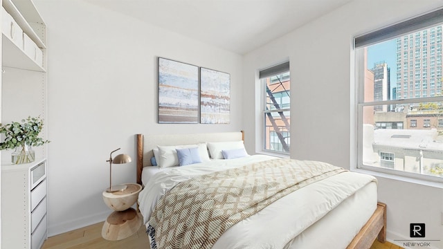 467 Pacific St Unit 18, New York City, NY 11217 - bedroom with baseboards and wood finished floors