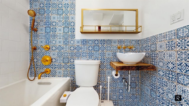467 Pacific St Unit 18, New York City, NY 11217 - bathroom with tile walls, wainscoting, and shower / washtub combination