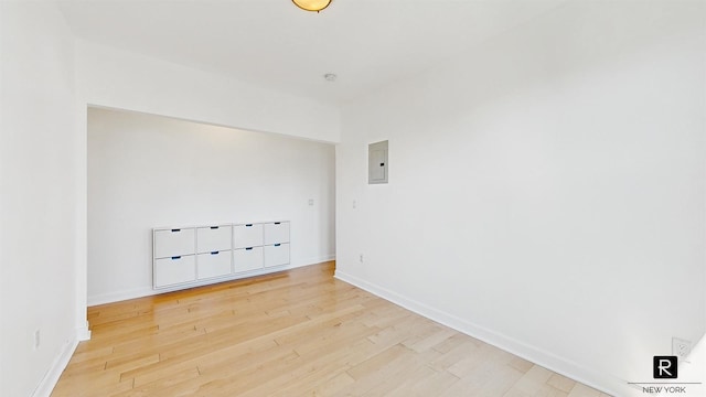 467 Pacific St Unit 18, New York City, NY 11217 - unfurnished room featuring electric panel and light wood-style floors