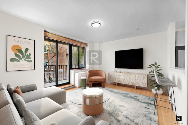445 W 19th St Unit 3-G, New York City, NY 10011 - living room with wood finished floors