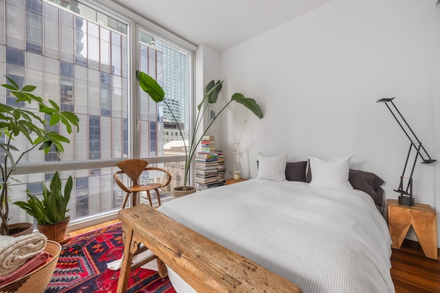 bedroom with wood finished floors