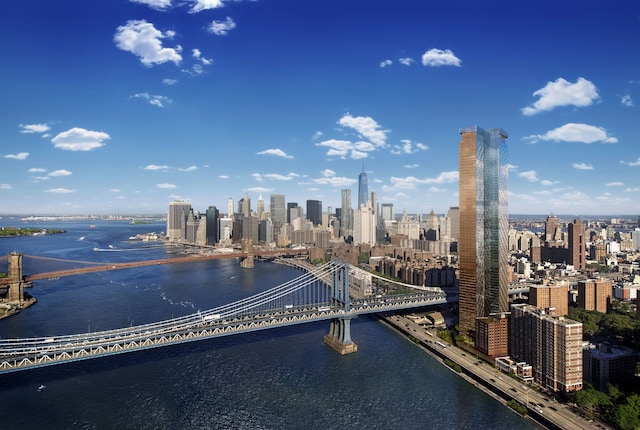 property's view of city with a water view