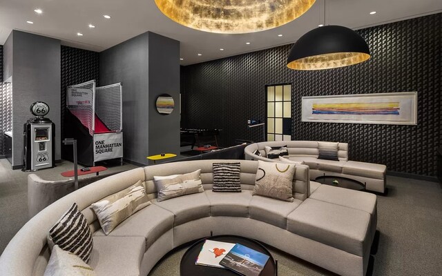 cinema room with carpet flooring and recessed lighting