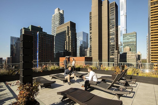 view of patio / terrace featuring a view of city