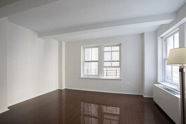150 W 51st St Unit 1730, New York City, NY 10019 - spare room featuring dark wood-style flooring and baseboards
