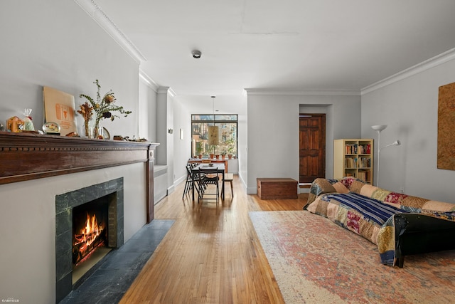 489 W End Ave, New York City, NY 10024 - bedroom with a premium fireplace, hardwood / wood-style floors, baseboards, and ornamental molding