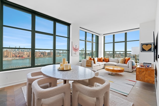 180 Front St Unit 17-E, New York City, NY 11201 - dining room featuring expansive windows and a water view