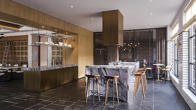 180 Front St Unit 17-E, New York City, NY 11201 - community bar area with stone tile flooring, wood walls, and recessed lighting