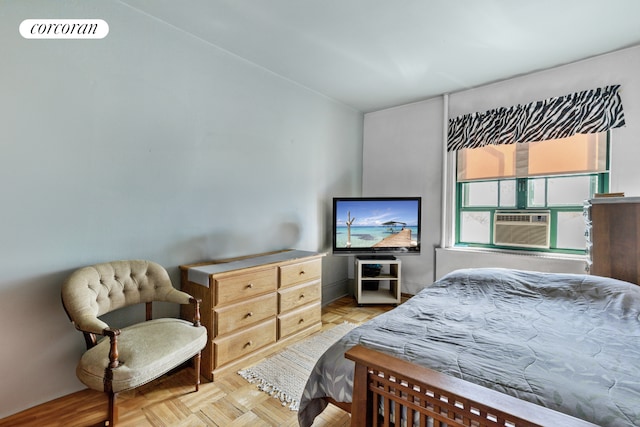 bedroom with visible vents and cooling unit