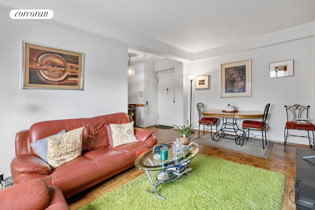 living room featuring visible vents