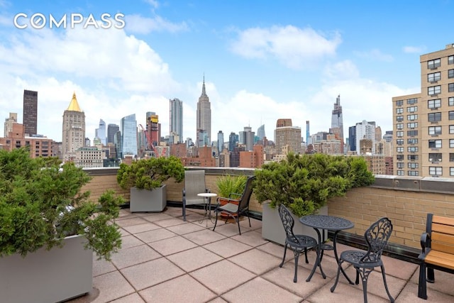 view of patio / terrace featuring a skyline view
