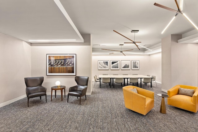 interior space with baseboards and carpet floors