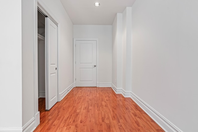 45-02 Ditmars Blvd Unit 231, New York City, NY 11105 - hallway featuring light wood-style floors, baseboards, and recessed lighting