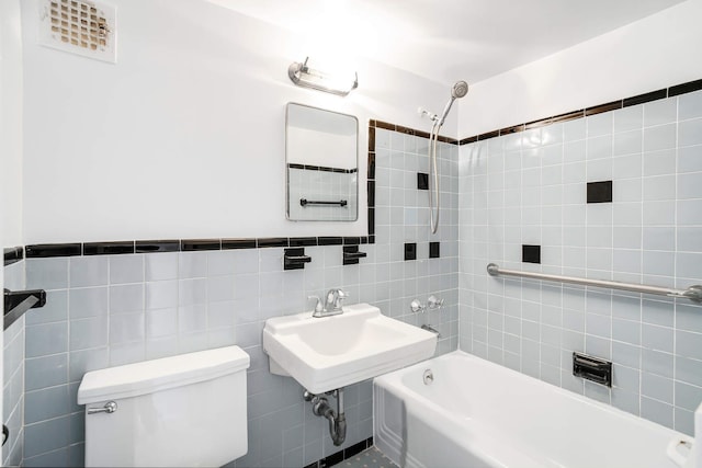 2727 Palisade Ave Unit 14-A, New York City, NY 10463 - full bath with bathing tub / shower combination, toilet, tile walls, and a sink