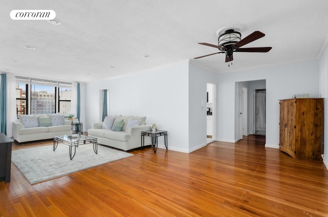 330 Lenox Rd Unit 6F, New York City, NY 11226 - living room with light wood-style floors, ceiling fan, baseboards, crown molding, and recessed lighting