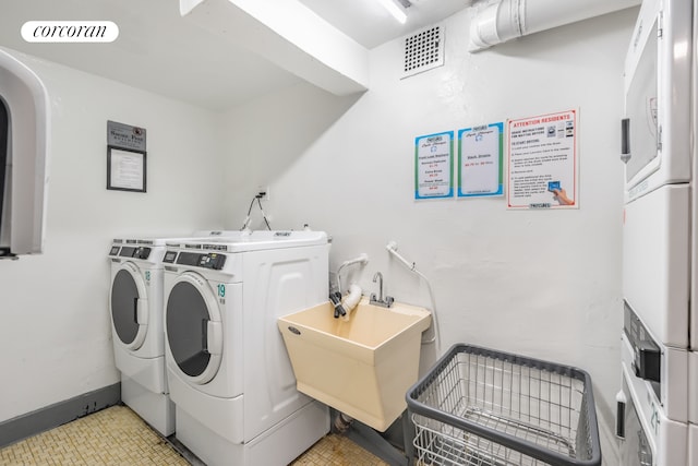 330 Lenox Rd Unit 6F, New York City, NY 11226 - shared laundry room featuring estacked washer and dryer, washing machine and clothes dryer, and light floors