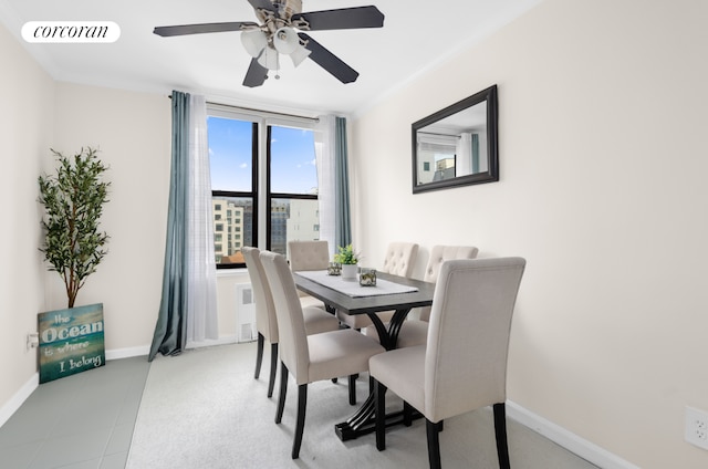 330 Lenox Rd Unit 6F, New York City, NY 11226 - dining space featuring ceiling fan, baseboards, and crown molding