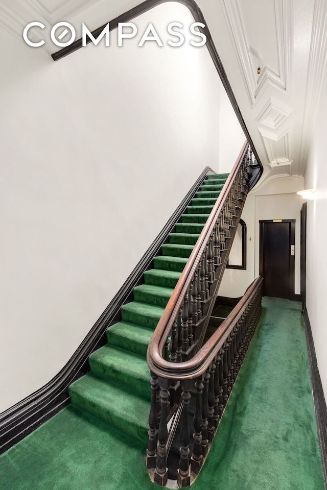 111 E 36th St Unit 4A, New York City, NY 10016 - stairway with carpet flooring and ornamental molding