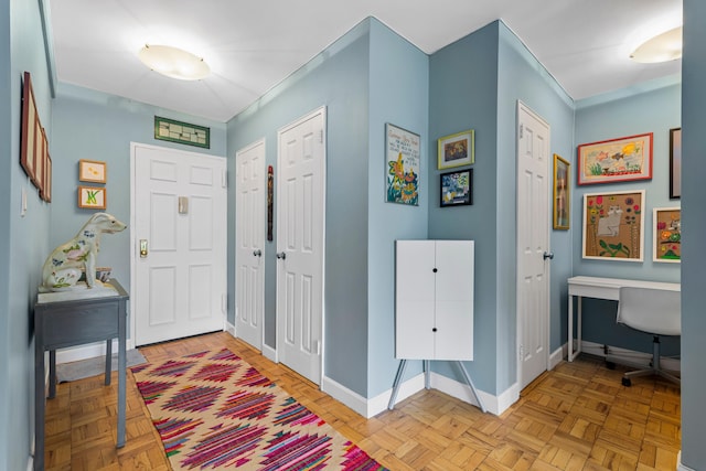 entrance foyer featuring baseboards