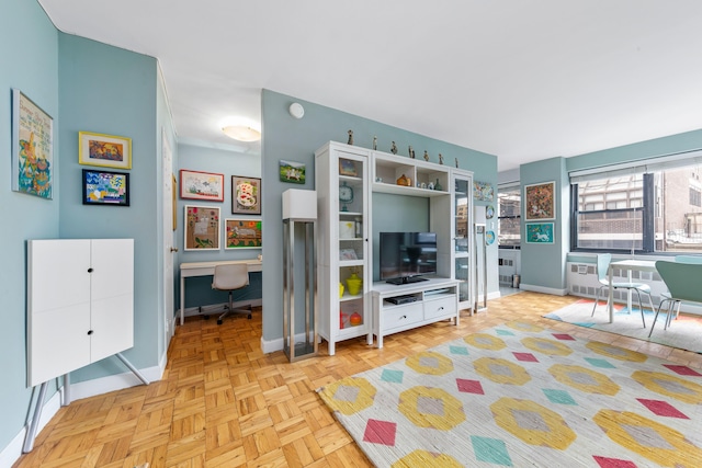 living area with baseboards