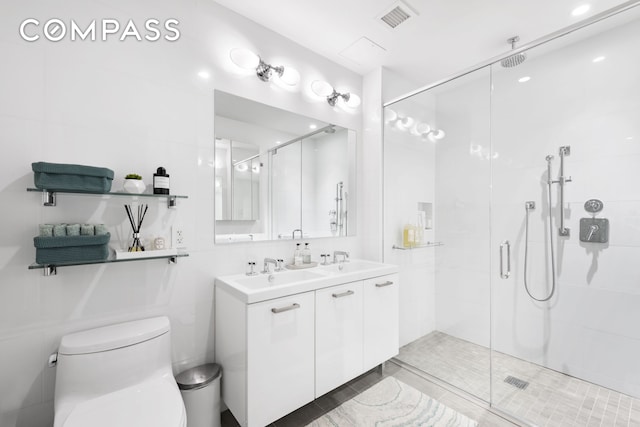 64 E 1st St Unit Th1, New York City, NY 10003 - bathroom featuring a shower stall and double vanity