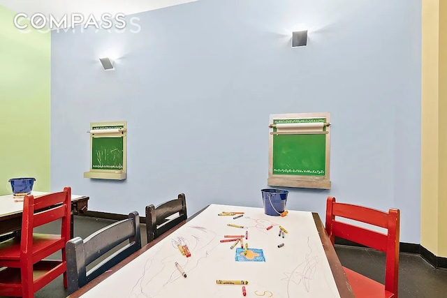 rec room with baseboards
