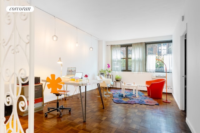 210 E 15th St Unit 1A, New York City, NY 10003 - dining area featuring a desk and baseboards