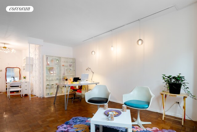 210 E 15th St Unit 1A, New York City, NY 10003 - playroom featuring a desk and baseboards