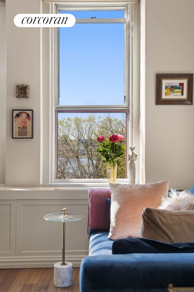 sitting room featuring wood finished floors