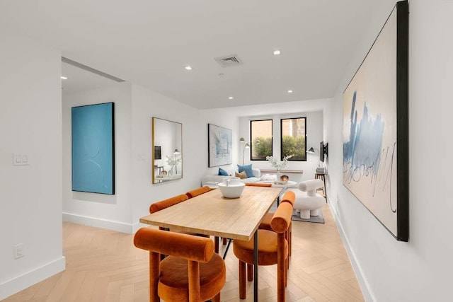 dining area featuring baseboards, visible vents, and recessed lighting