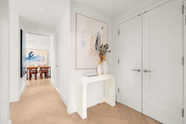 hallway with recessed lighting