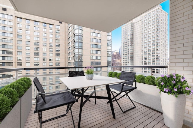 200 E 66th St Unit B1405, New York City, NY 10065 - balcony featuring a view of city and outdoor dining space