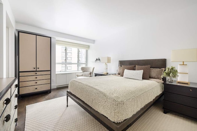 200 E 66th St Unit B1405, New York City, NY 10065 - bedroom with dark wood-style floors