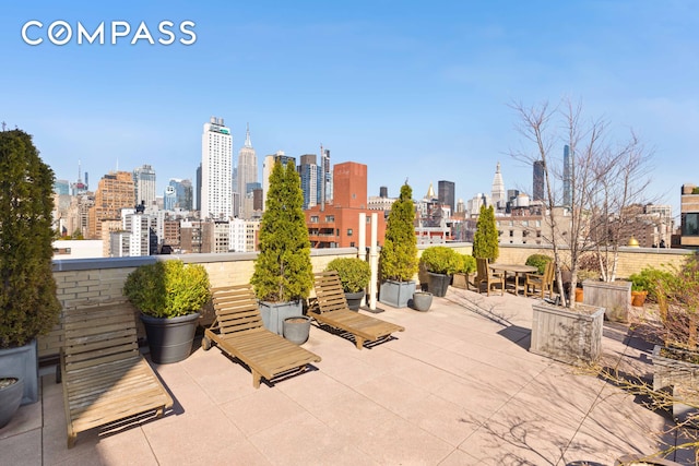 200 W 20th St Unit 1002, New York City, NY 10011 - view of patio featuring a skyline view