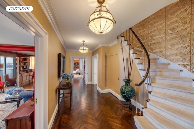 1 E End Ave Unit 8/9B, New York City, NY 10075 - foyer with baseboards, stairs, a chandelier, and ornamental molding