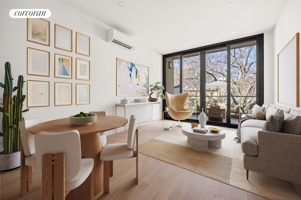 dining space with a wall unit AC, floor to ceiling windows, wood finished floors, and recessed lighting