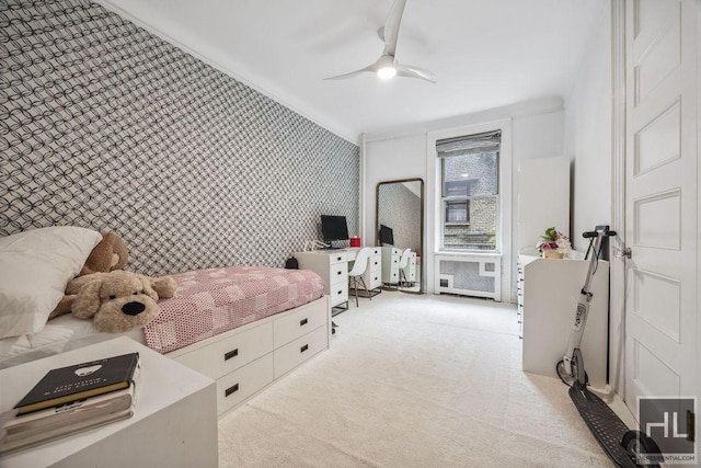 311 W 97th St Unit 3N, New York City, NY 10025 - bedroom with light carpet, an office area, wallpapered walls, and a ceiling fan